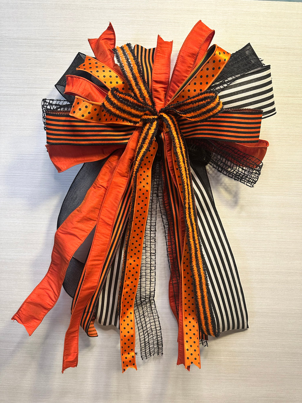 Enchanted Noir Luxury Oversized Door Bow | Orange, Black & White Halloween Statement Bow