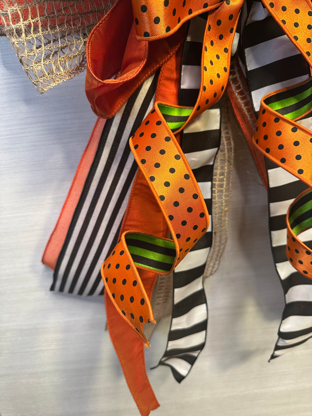 A Touch of Magic Luxury Oversized Door Bow | Orange, Black & White Halloween Statement Bow
