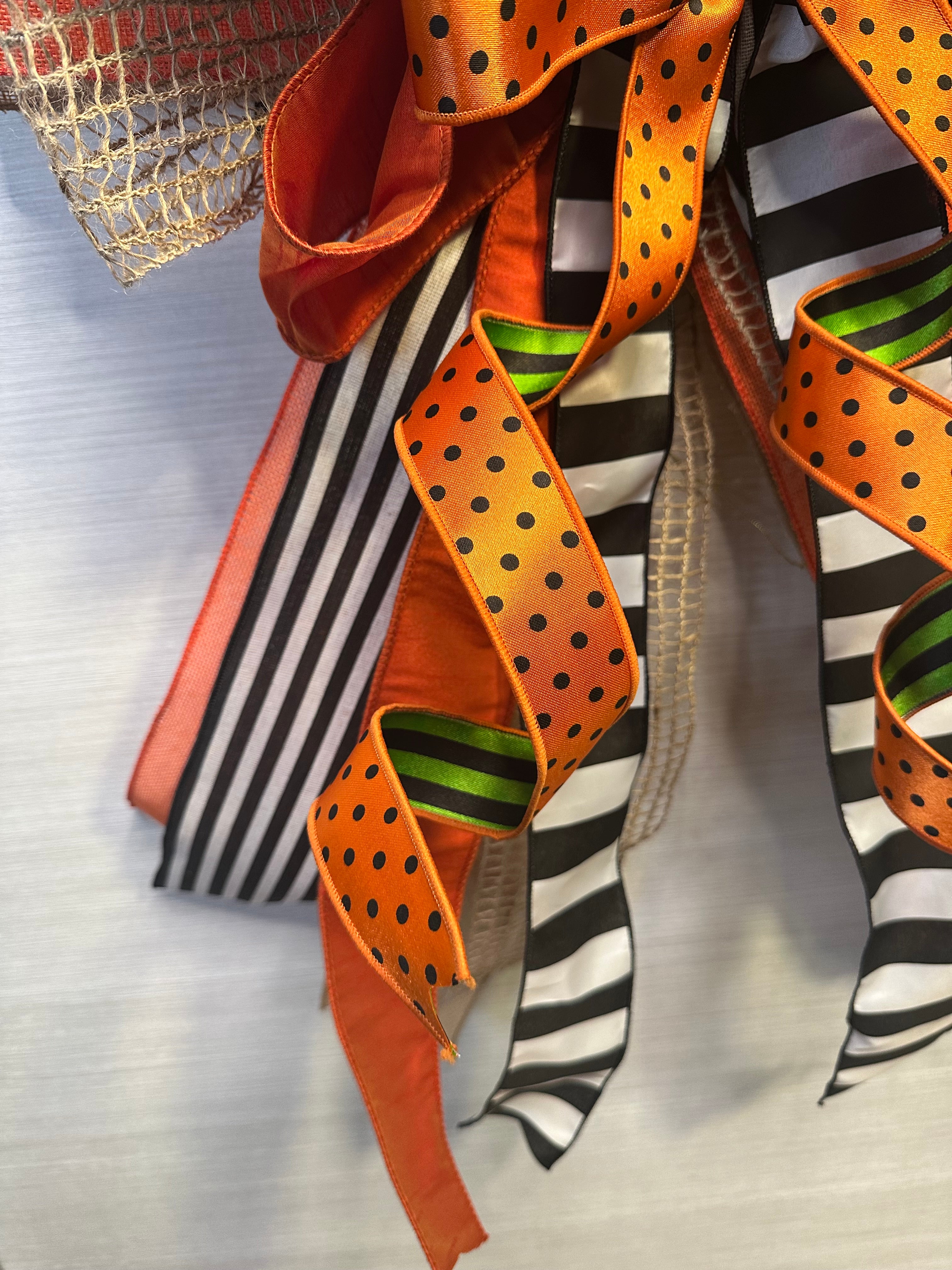 A Touch of Magic Luxury Oversized Door Bow | Orange, Black & White Halloween Statement Bow