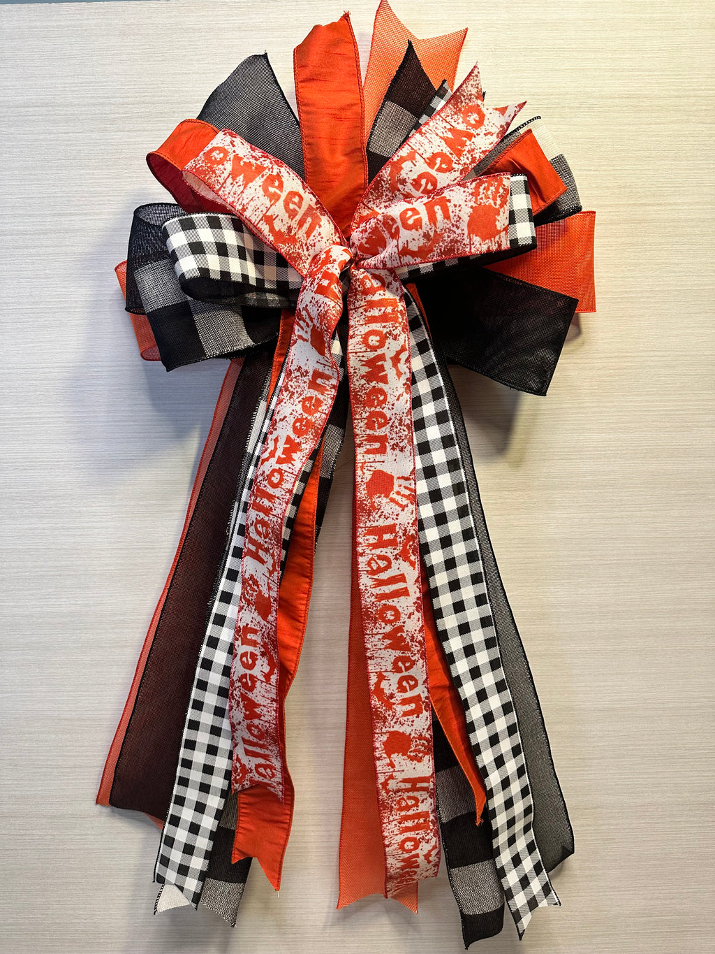 Haunted Hollow Luxury Oversized Door Bow | Orange, Black & White Halloween Statement Bow