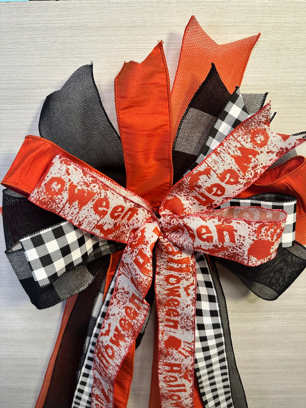 Haunted Hollow Luxury Oversized Door Bow | Orange, Black & White Halloween Statement Bow