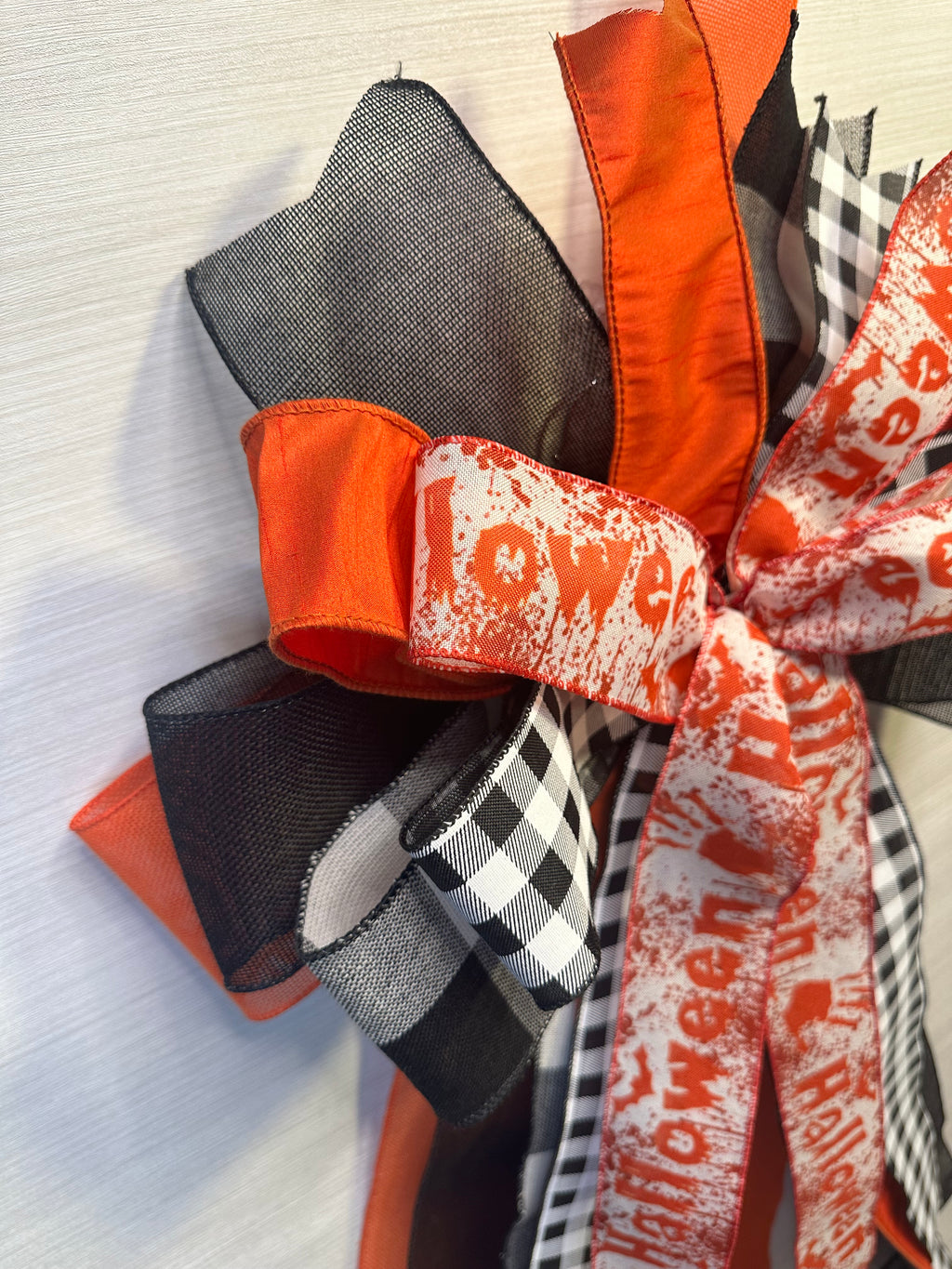 Haunted Hollow Luxury Oversized Door Bow | Orange, Black & White Halloween Statement Bow
