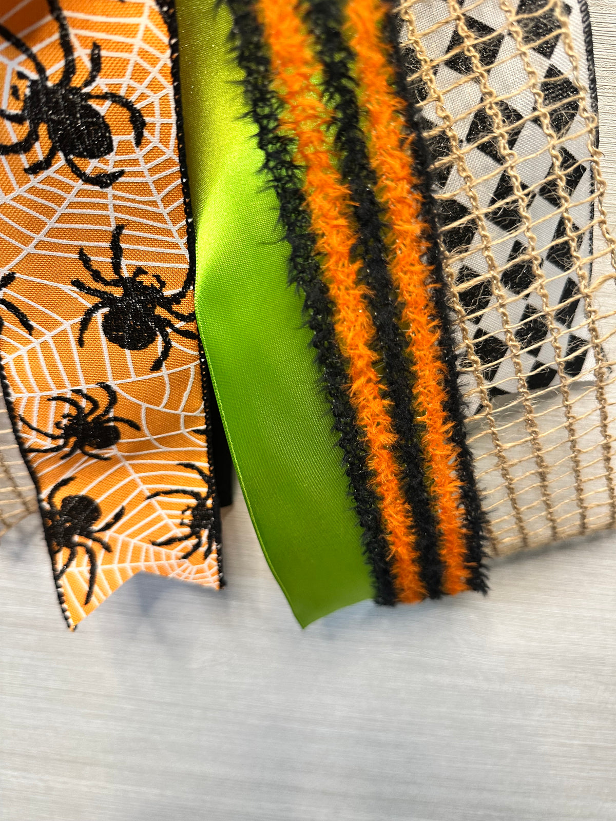 Spider’s Kiss Luxury Oversized Door Bow – Orange, Lime Green & Black Halloween Statement Bow